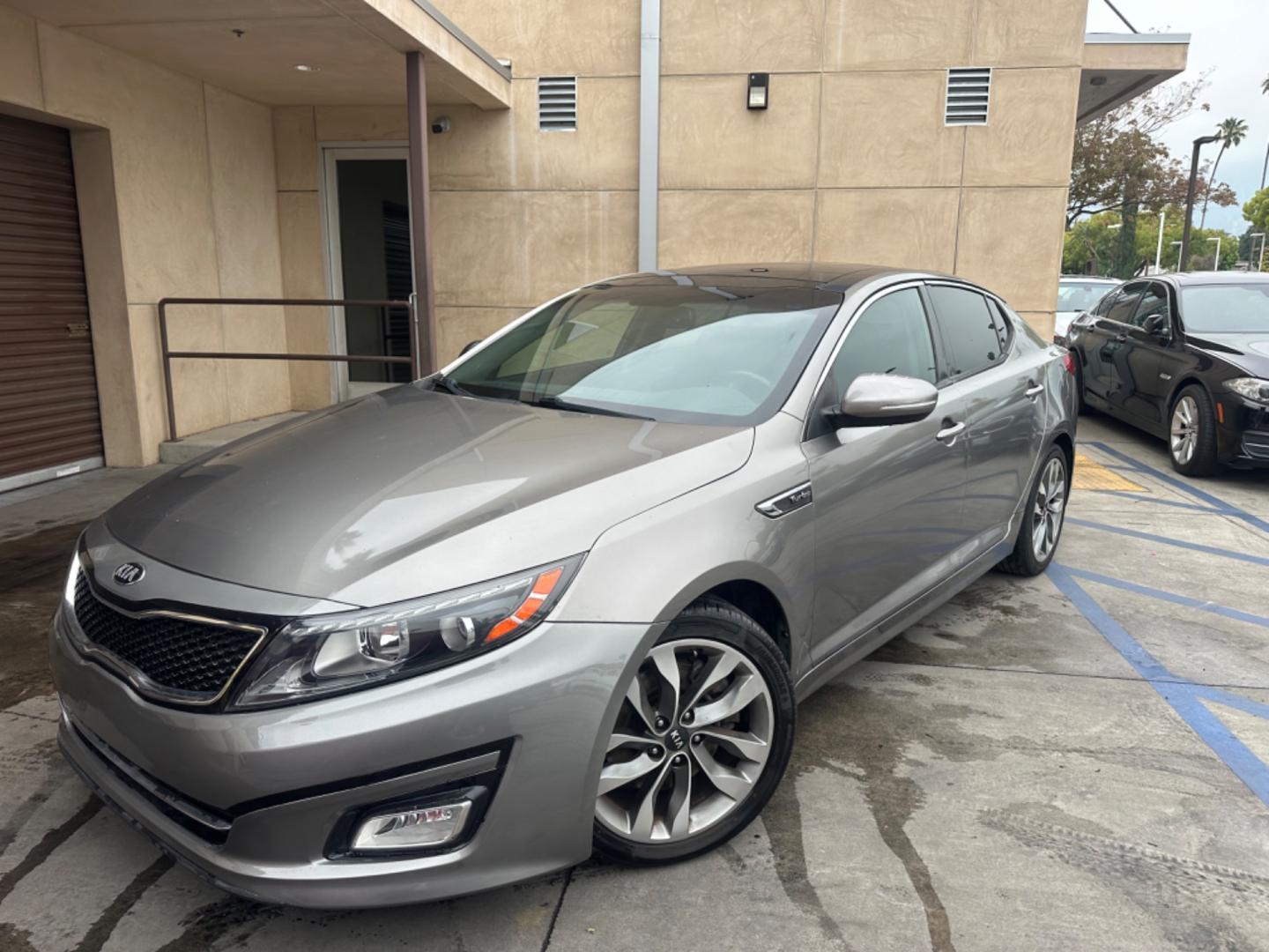 2014 Gray /BLACK Kia Optima SX Turbo (5XXGR4A62EG) with an 2.0L L4 DOHC 16V TURBO engine, 6-Speed Automatic transmission, located at 30 S. Berkeley Avenue, Pasadena, CA, 91107, (626) 248-7567, 34.145447, -118.109398 - New tires! Moon Roof! Nice Interior! Looks and drives good! Bad credit? We can help! We are the bank. All our cars are thoroughly inspected and reconditioned by our technicians. FREE CARFAX report. Stop by or call to speak with our friendly staff. Whether you have bad credit, no credit, bankruptcy, - Photo#0